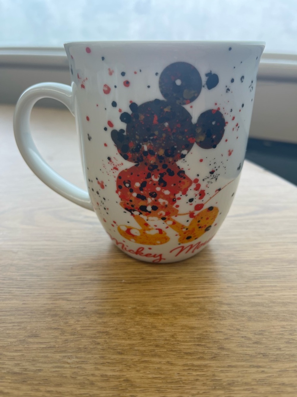 Disney White Ceramic Mug with Black, Red, Yellow Mickey Silhouette - Picture 1 of 4